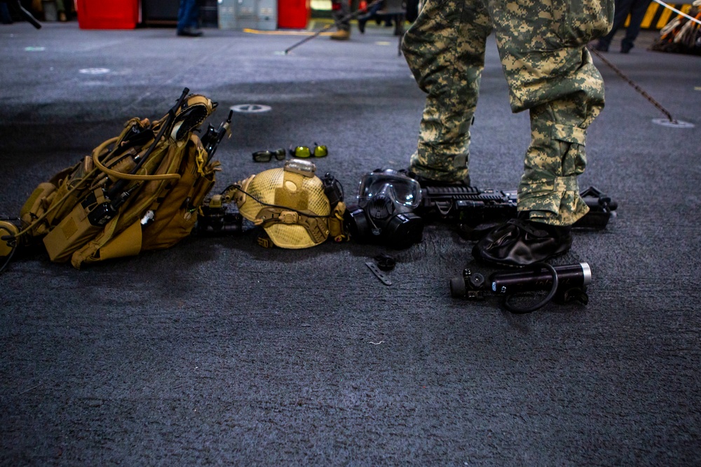 15th MEU ADR Marines suit up for raid training operations