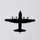 Sweden and U.S. Strengthen Air Capabilities During Swedish-led Bilateral Exercise A silhouetted four-engine turboprop military transport aircraft is photographed from below against an overcast grey sky. A person and a suspended load are visible below the aircraft, connected by lines, indicating an aerial extraction or resupply operation in progress. The entire image is rendered in stark black silhouette with no color detail visible.
