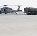 AUAB Airmen conduct hot-pit refueling on Navy MH-60S Seahawk helicopter