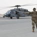 AUAB Airmen conduct hot-pit refueling on Navy MH-60S Seahawk helicopter