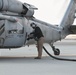 AUAB Airmen conduct hot-pit refueling on Navy MH-60S Seahawk helicopter