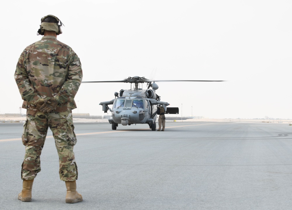 AUAB Airmen conduct hot-pit refueling on Navy MH-60S Seahawk helicopter