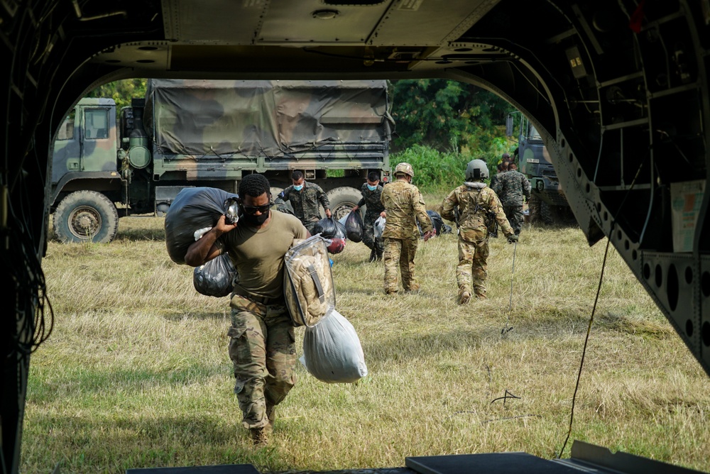 JTF-Bravo and Honduran Army load CH-47 Chinook with life-saving supplies