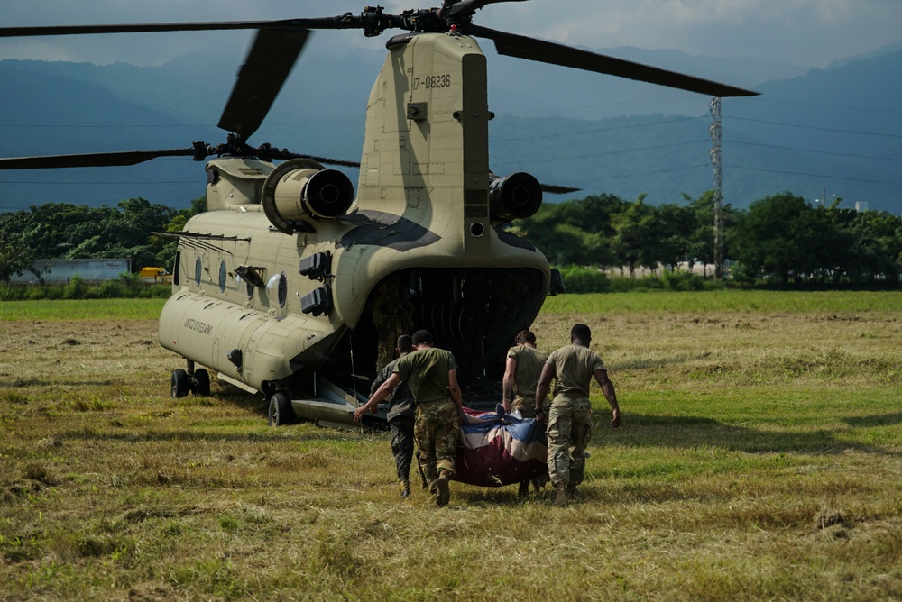 JTF-Bravo and Honduran Army load CH-47 Chinook with life-saving supplies