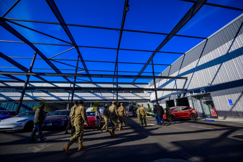 Travis Airmen visit Tesla, streamline processes in vehicle maintenance