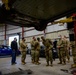 Travis Airmen visit Tesla, streamline processes in vehicle maintenance