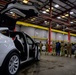 Travis Airmen visit Tesla, streamline processes in vehicle maintenance