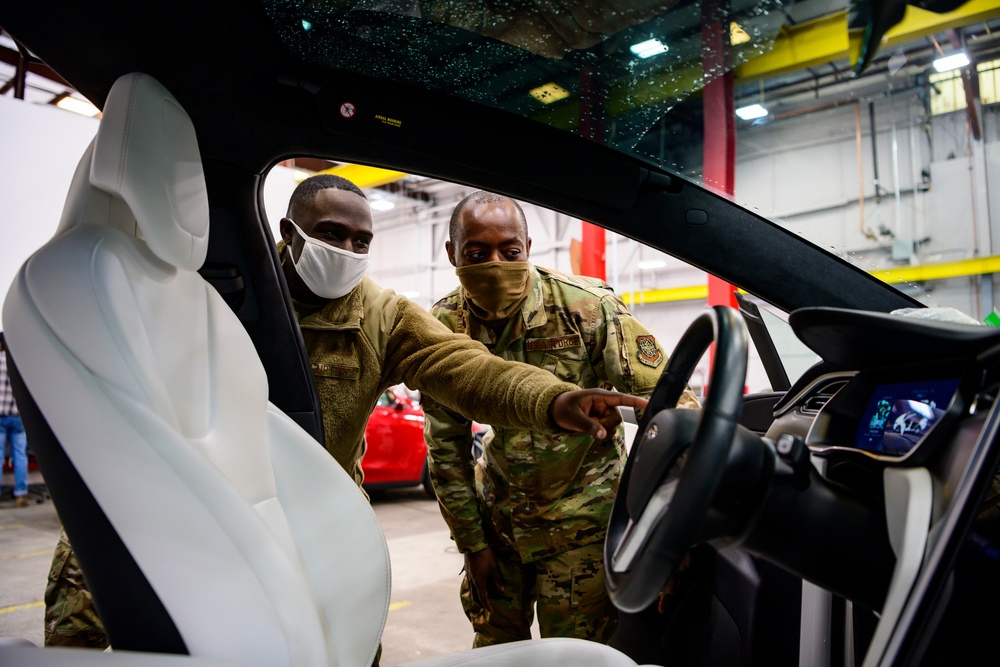 Travis Airmen visit Tesla, streamline processes in vehicle maintenance