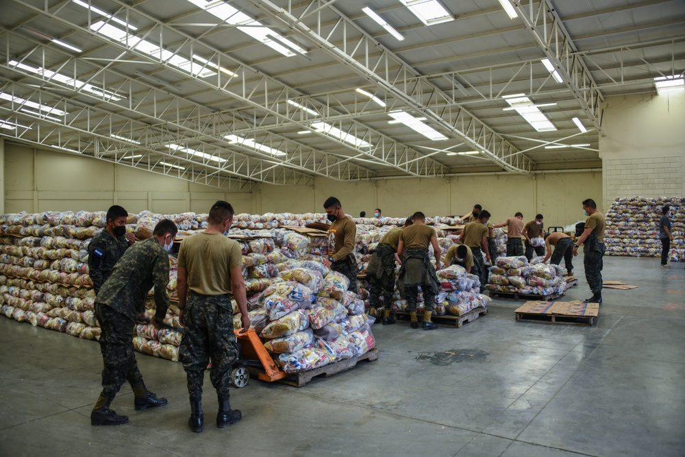 JTF-Bravo and Honduran Army load and deliver life-saving supplies