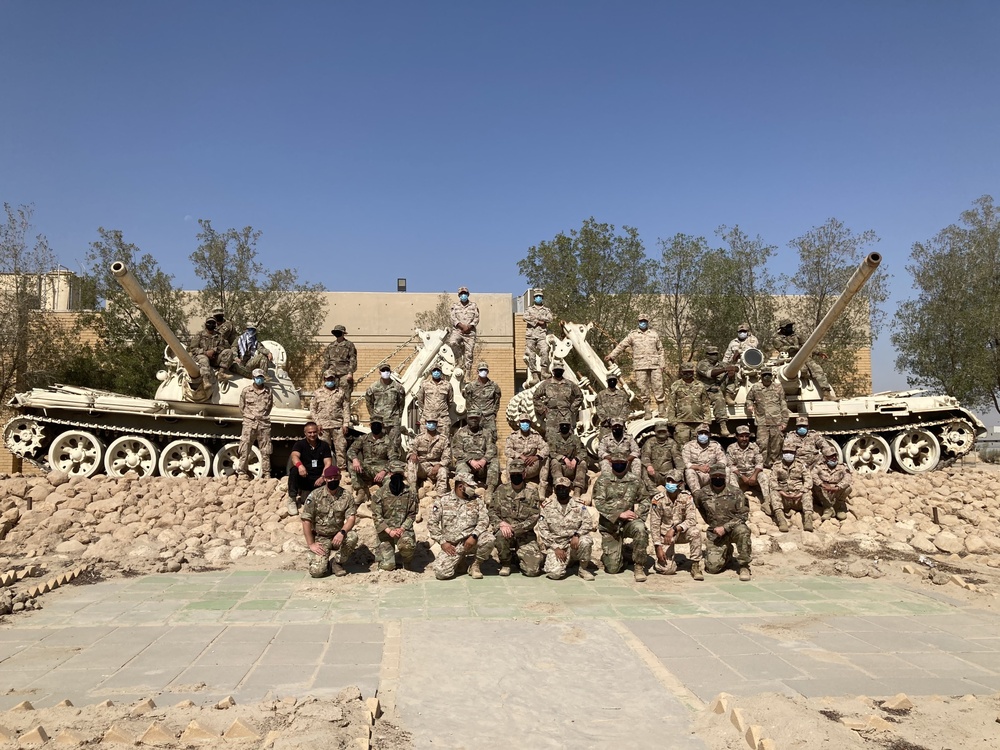 Kuwaiti Land Force School Engineers and U.S. Army Engineers of Task Force Iron Castle collaborate during the Non‐ Commissioned Officer Workshop, an Engineer course devised by the 16th Engineer Brigade