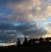 American flag, sunrise, and Veterans Day at Fort McCoy