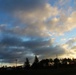 American flag, sunrise, and Veterans Day at Fort McCoy