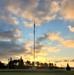 American flag, sunrise, and Veterans Day at Fort McCoy