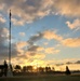 American flag, sunrise, and Veterans Day at Fort McCoy