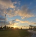 American flag, sunrise, and Veterans Day at Fort McCoy