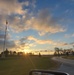 American flag, sunrise, and Veterans Day at Fort McCoy