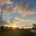 American flag, sunrise, and Veterans Day at Fort McCoy