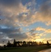 American flag, sunrise, and Veterans Day at Fort McCoy