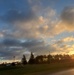 American flag, sunrise, and Veterans Day at Fort McCoy