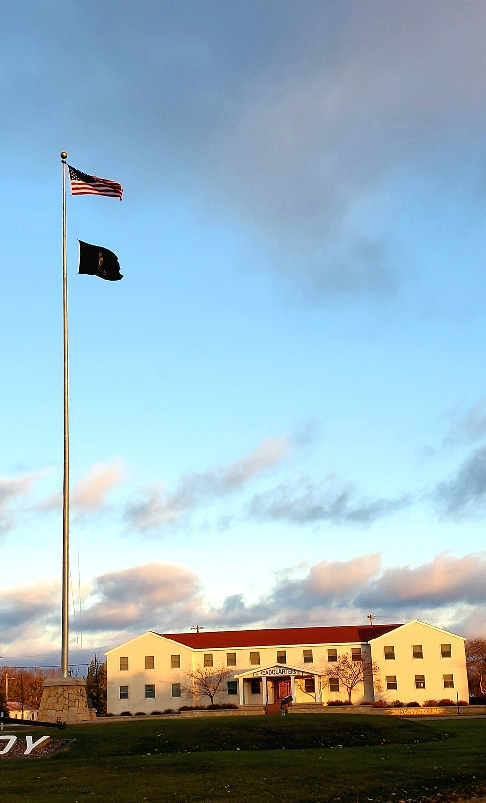 American flag, sunrise, and Veterans Day at Fort McCoy