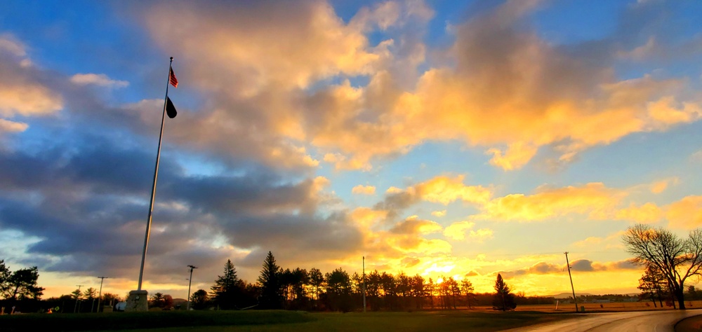 American flag, sunrise, and Veterans Day at Fort McCoy