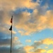 American flag, sunrise, and Veterans Day at Fort McCoy