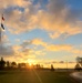 American flag, sunrise, and Veterans Day at Fort McCoy