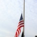 Fort McCoy Police Department officers complete flag raising event