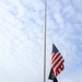 Fort McCoy Police Department officers complete flag raising event