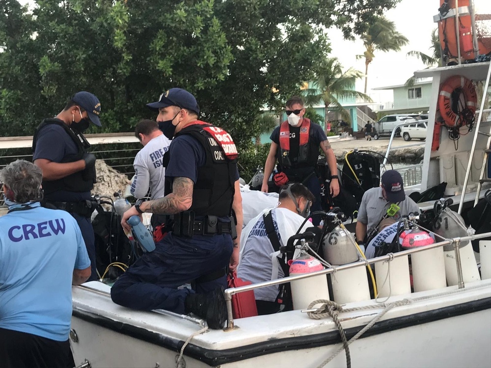 Coast Guard transfers snorkeler to awaiting EMS near Tavernier Creek