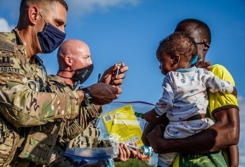 475th EABS connects with ‘neighbors’ delivering supplies, candy
