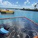 Coast Guard monitors clean-up operations for oil discharge from partially sunken tugboat in St. Croix, U.S. Virgin Islands