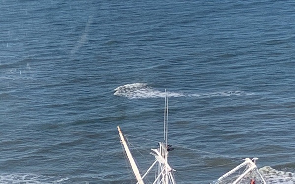 Coast Guard crews work to remove product from aground fishing vessel east of Egg Island, GA
