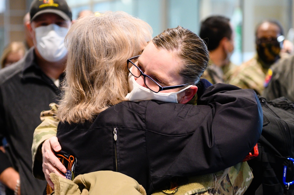 Airmen return home from overseas deployment