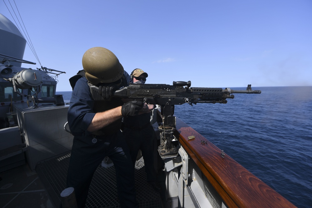 USS Ralph Johnson Sailors Fire M240 Machine Gun