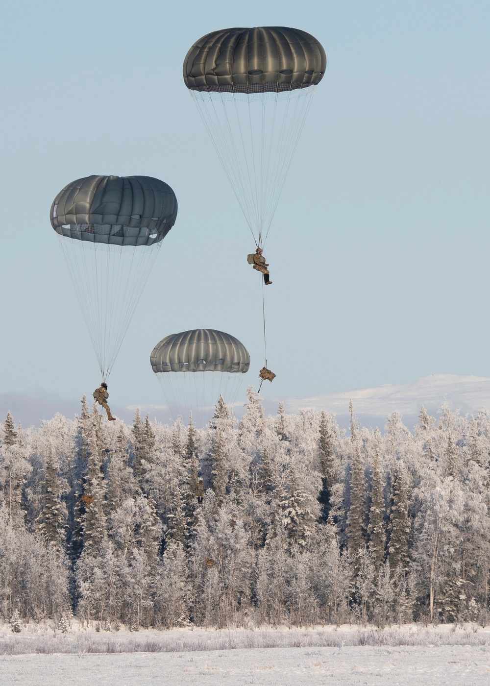 Soldiers, Airmen jump onto a frozen drop zone