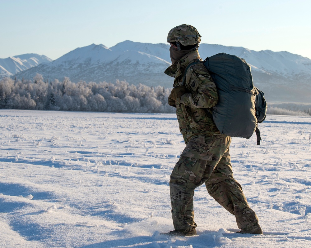 Soldiers, Airmen jump onto a frozen drop zone