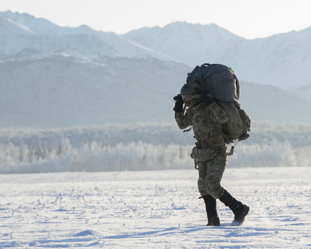 Soldiers, Airmen jump onto a frozen drop zone