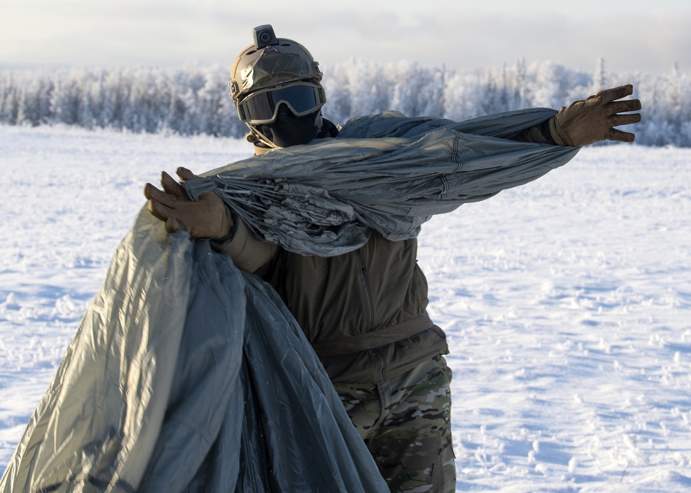 Soldiers, Airmen jump onto a frozen drop zone