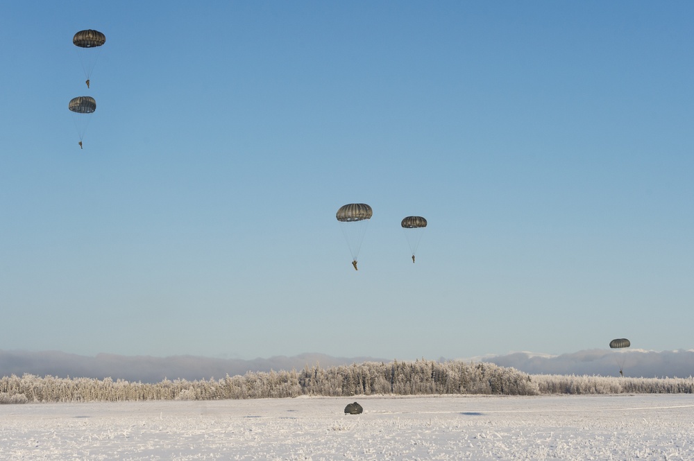 Air Force special warfare Airmen and Army paratroopers conduct airborne operations at JBER
