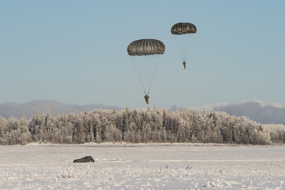 Air Force special warfare Airmen and Army paratroopers conduct airborne operations at JBER