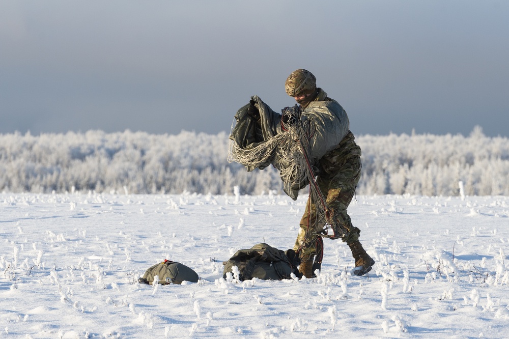 Air Force special warfare Airmen and Army paratroopers conduct airborne operations at JBER