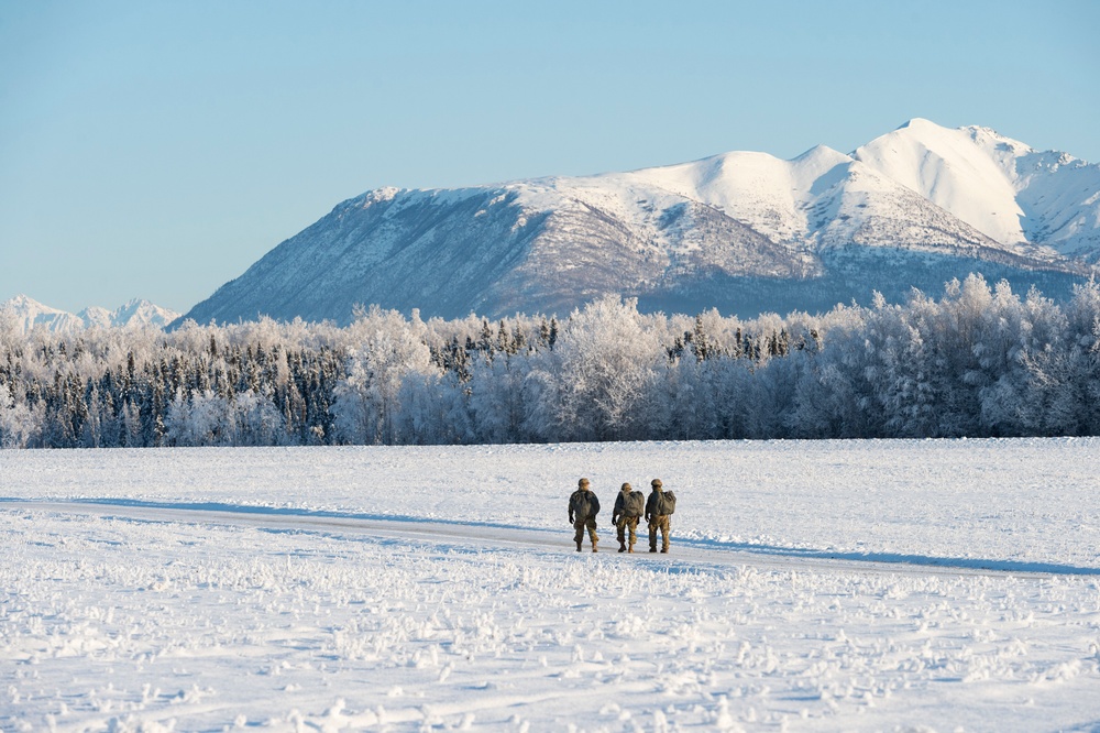 Air Force special warfare Airmen and Army paratroopers conduct airborne operations at JBER