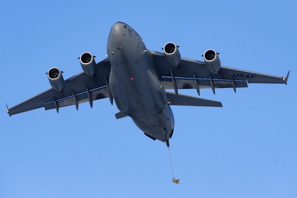 Air Force special warfare Airmen and Army paratroopers conduct airborne operations at JBER