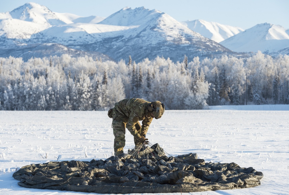 Air Force special warfare Airmen and Army paratroopers conduct airborne operations at JBER
