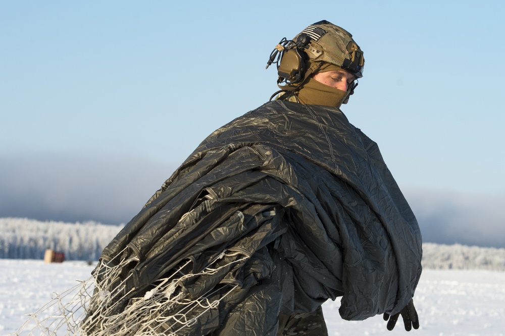 Air Force special warfare Airmen and Army paratroopers conduct airborne operations at JBER