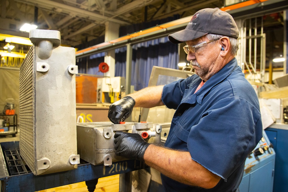 Shipping containers used to deliver components to the warfighter