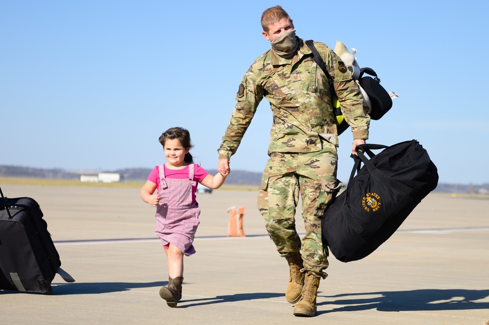 Airmen greeted by families after deployment