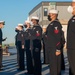Sailor inspects uniforms