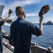 Nimitz Sailors Wave Fairwell to Indian Ship During Malabar 2020